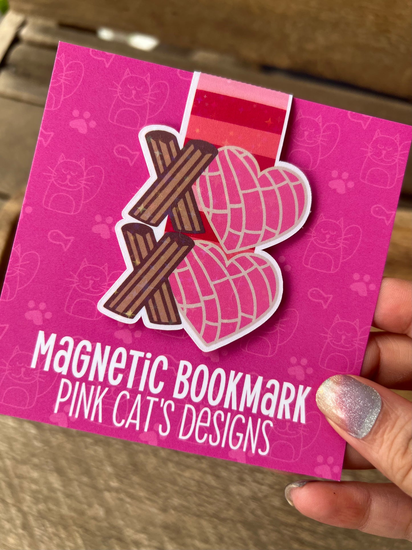 magnetic bookmark with a xoxo design made out of churros and conchas