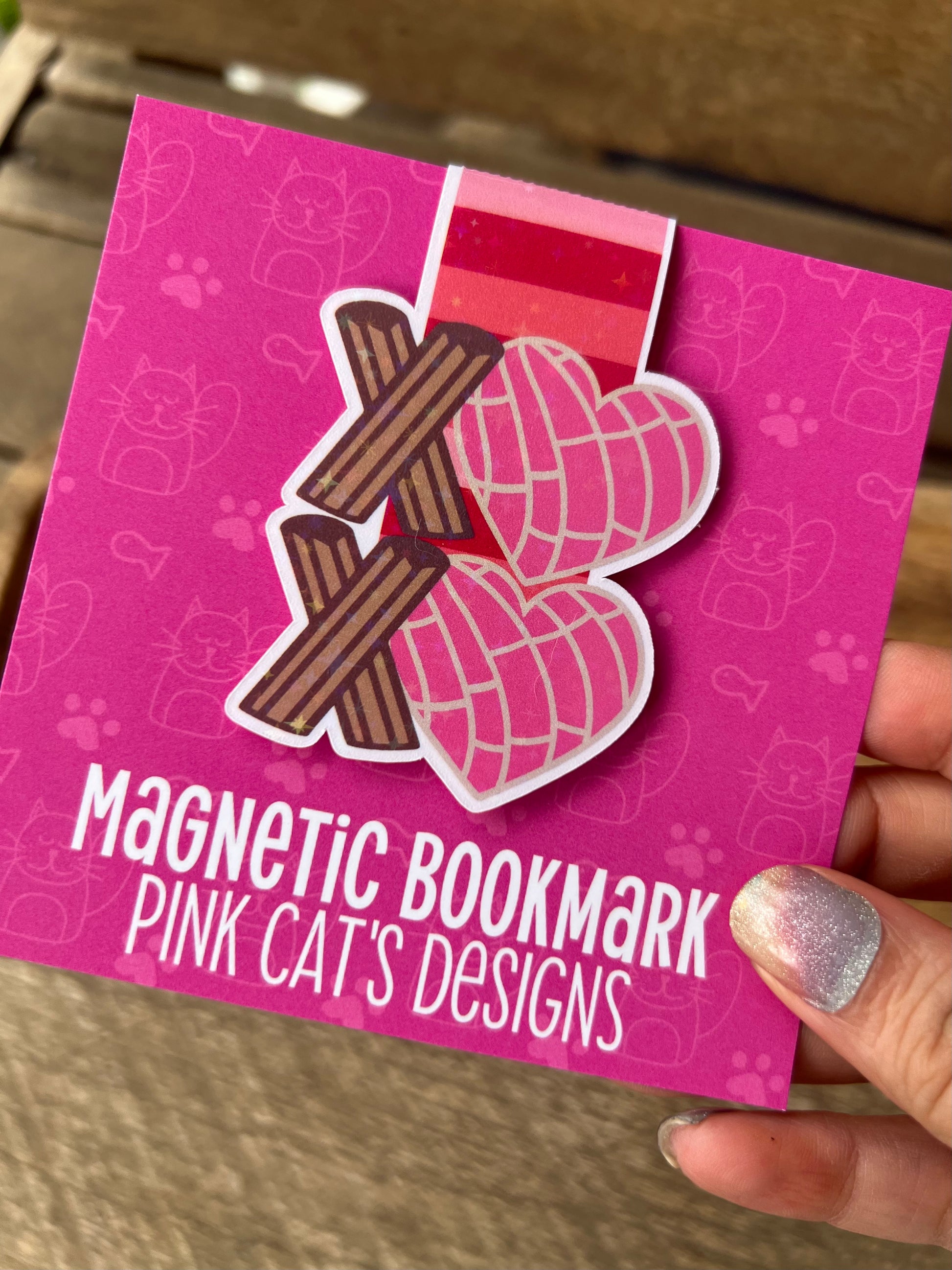 magnetic bookmark with a xoxo design made out of churros and conchas 